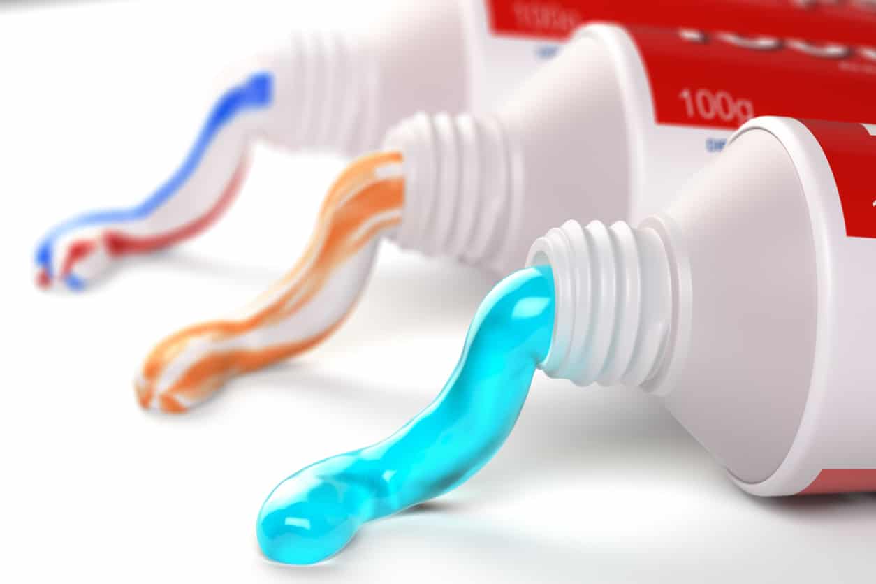 toothpaste coming out of the tube