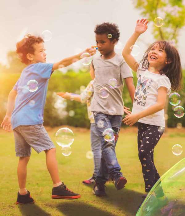 Kid,And,Friends,In,International,Preschool,Play,A,Bubble,In Kid,And,Friends,In,International,Preschool,Play,A,Bubble,In